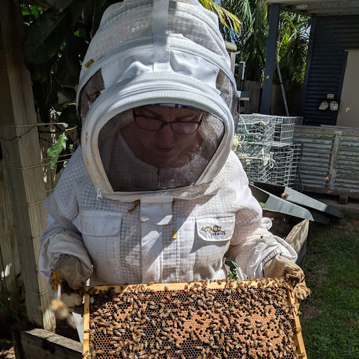 Ruth inspecting her bees